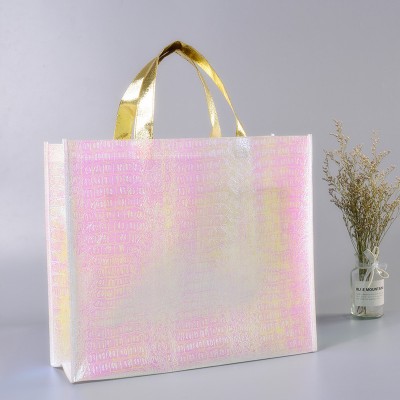 Sacs en tissu non tissé laser personnalisée, emballage d'achat pliant à main en tissu non tissé