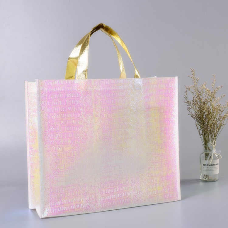 Sacs en tissu non tissé laser personnalisée, emballage d'achat pliant à main en tissu non tissé