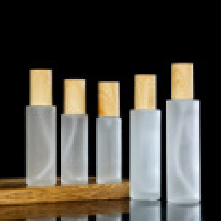 Nouvelle bouteille en verre avec bouchon en grain de bois, bouteille de lotion de sous-embouteillage, bouteille de crème, presse bouteille d'eau cosmétique en gros portable