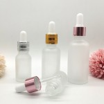 Spot transparent 30 ml compte-gouttes d'huile essentielle bouteille vide en verre cosmétique sous-embouteillage tête en plastique essence bouteille liquide d'origine